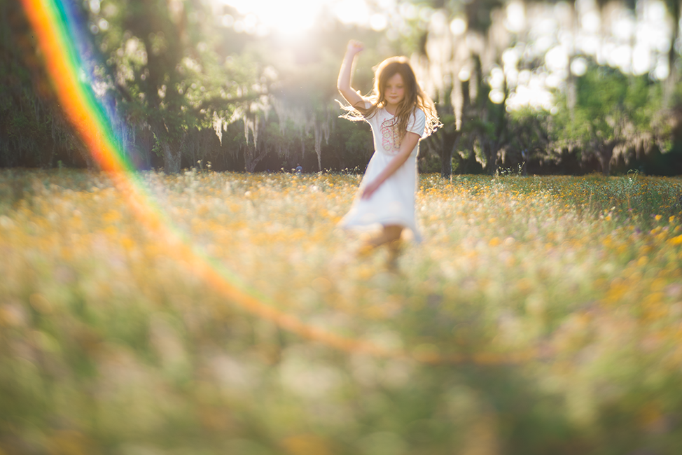 child dancing in flower field | Spring session Jacksonville FL