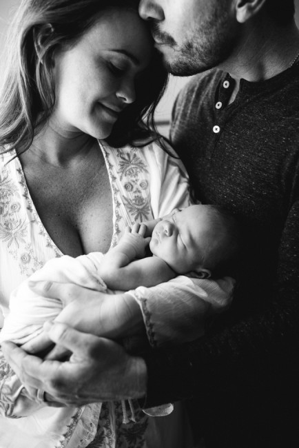 parents with newborn child | Jacksonville newborn family photographer