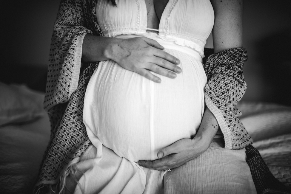 pregnant mom holding her belly | jacksonville maternity photographer