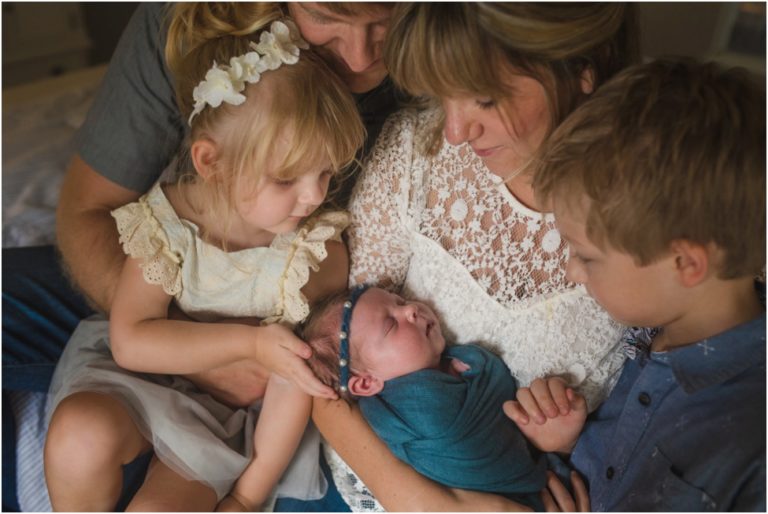 Wonderful family photos with 10 days old baby. At home newborn session Jacksonville Florida. Baby Photographer Ponte Vedra Beach.