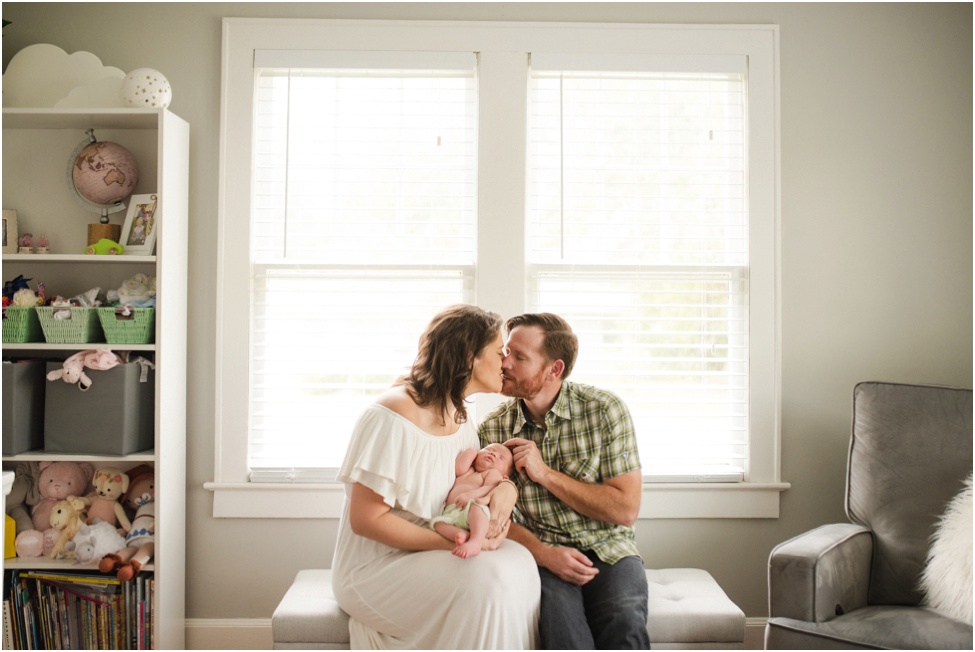 Newborn baby girl in her adorable home. Jacksonville and Ponte Vedra newborn photographer. At home newborn session. Parents and their new baby. Florida baby and family photographer