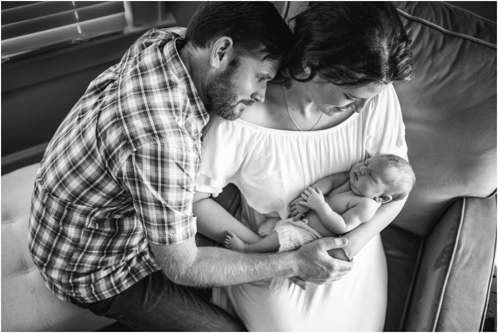 Newborn baby girl in her adorable home. Jacksonville and Ponte Vedra newborn photographer. At home newborn session. Parents and their new baby. Florida baby and family photographer