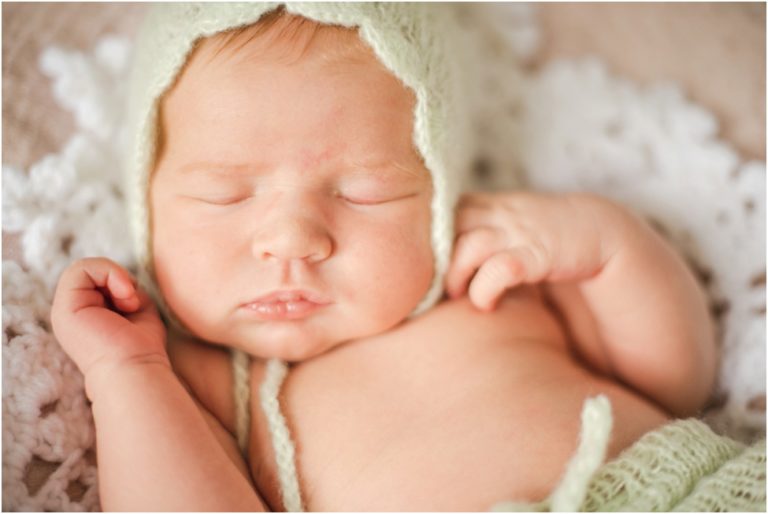 Newborn baby girl in her adorable home. Jacksonville and Ponte Vedra newborn photographer. At home newborn session. Parents and their new baby. Florida baby and family photographer