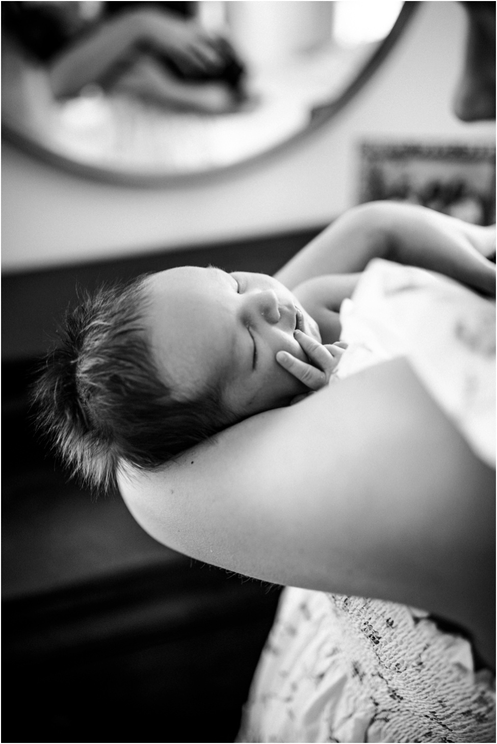 Ponte Vedra newborn photographer. Jacksonville baby session. At home family photos with 7 days old baby boy. San Marco parents with their new son. New baby boy and his furry friend