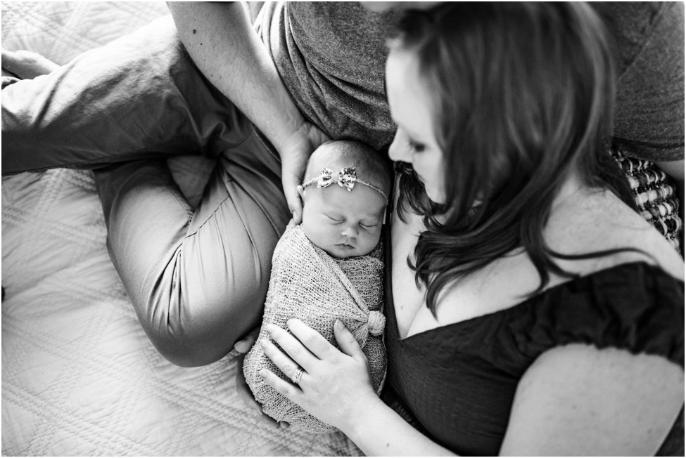 Jacksonville parents with their baby. Jax at home newborn session. At home newborn session Jacksonville Florida_0031.jpg
