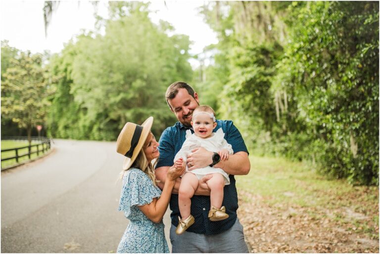 Jacksonville family portraits in the park. A walk in the park photo session. Capturing family connection and little baby girl in the park