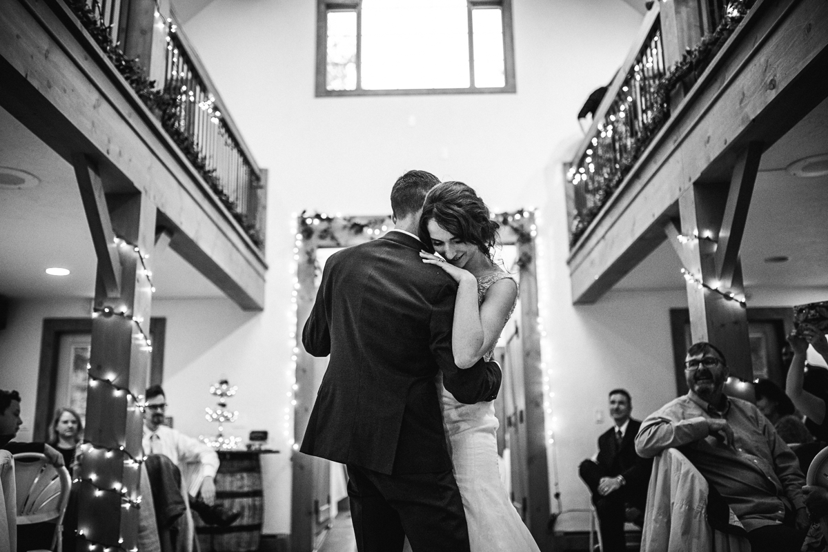 married couple having their first dance in their venue by Jacksonville wedding photographer