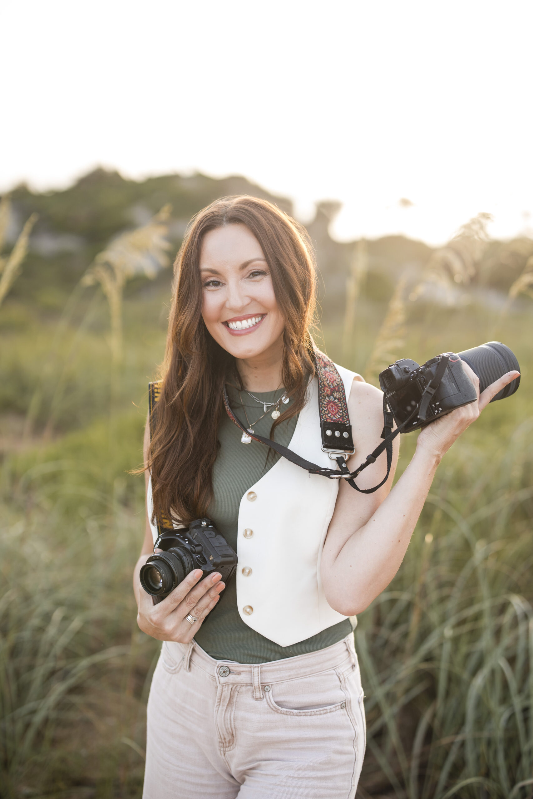headshot of Jacksonville family photographer holding camera on Guana Preserve Ponte Vedra Beach