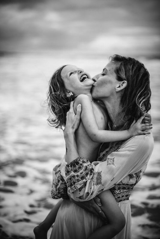 Motherhood and maternity on the beach in a soulful mommy and me session in Jacksonville Florida