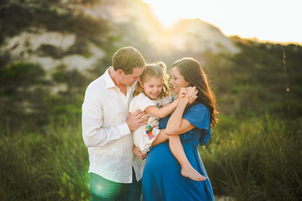 Sunset maternity beach photoshoot in Jacksonville FL