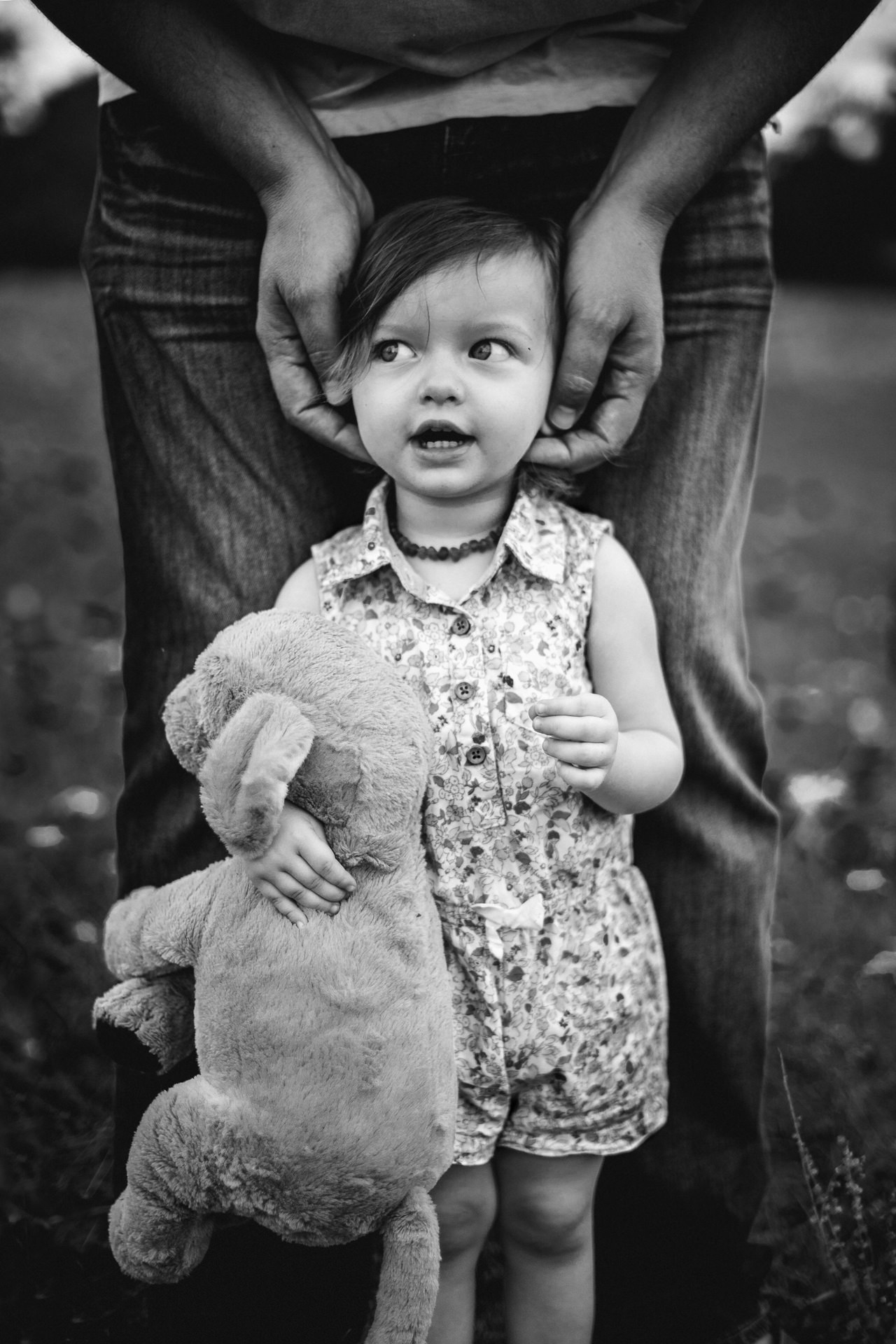 toddler holding stuffed animal in a photo Jacksonville children's photoshoot