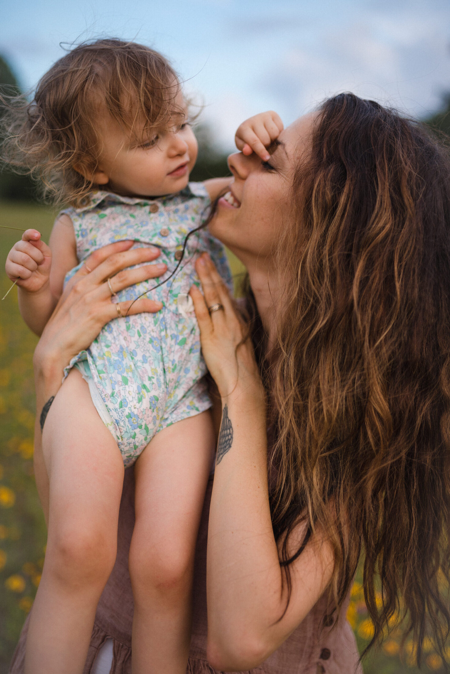 mother holding young child in a Jacksonville children's photoshoot