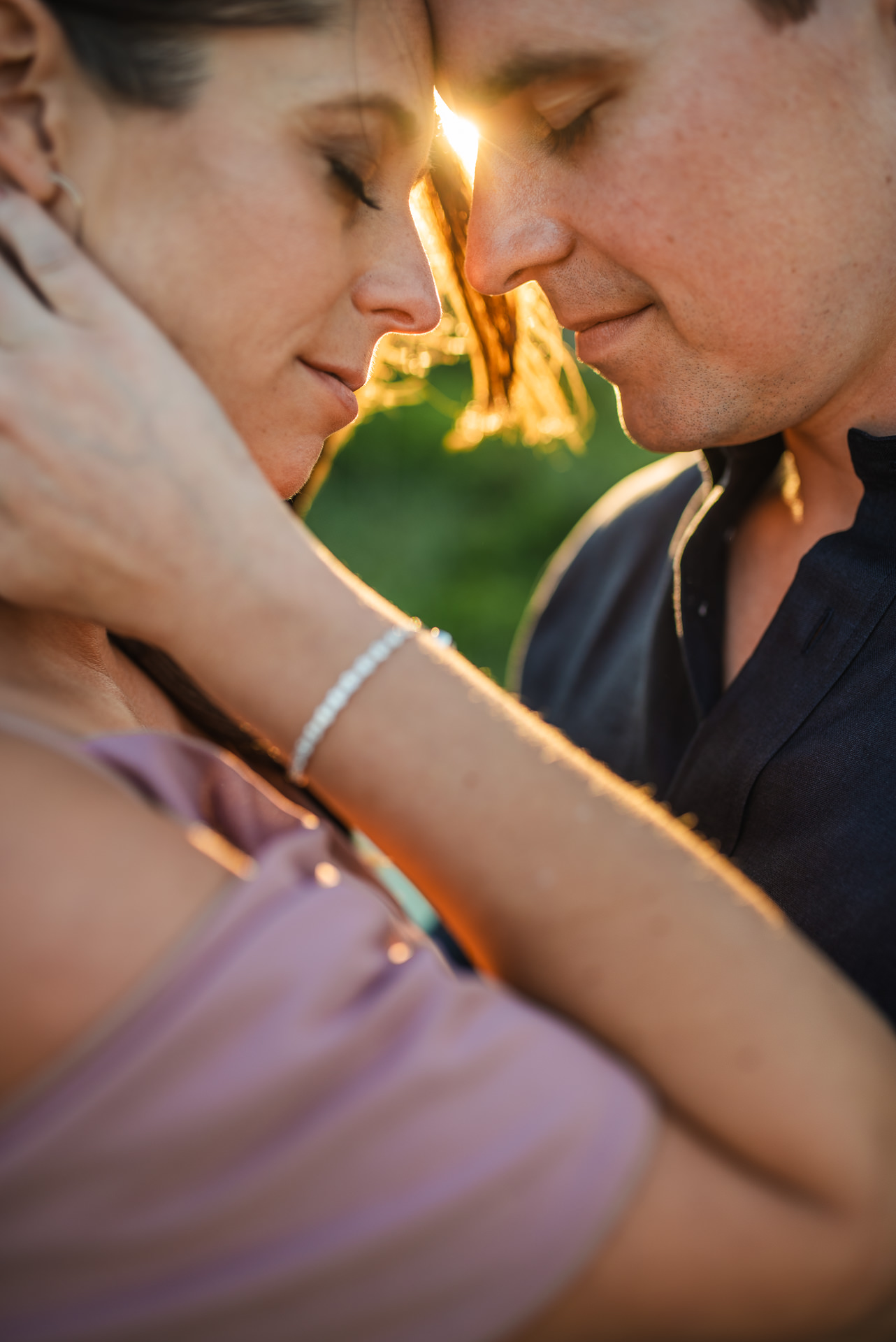 close up of couple holding each other facing each other in a jacksonville couples photoshoot