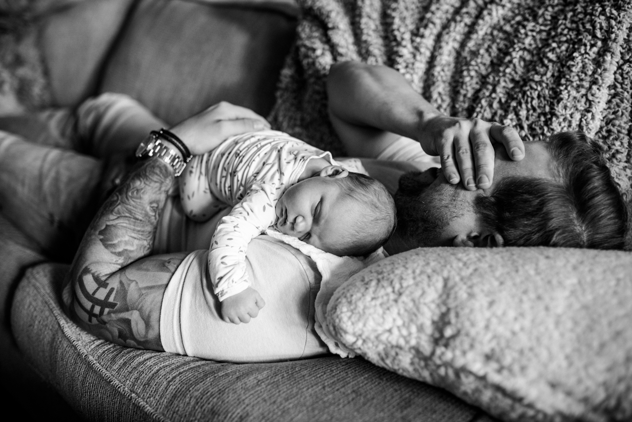 Dad getting emotional while holding his new son during Jacksonville at home newborn session by Monika Colichio Ponte Vedra newborn photographer